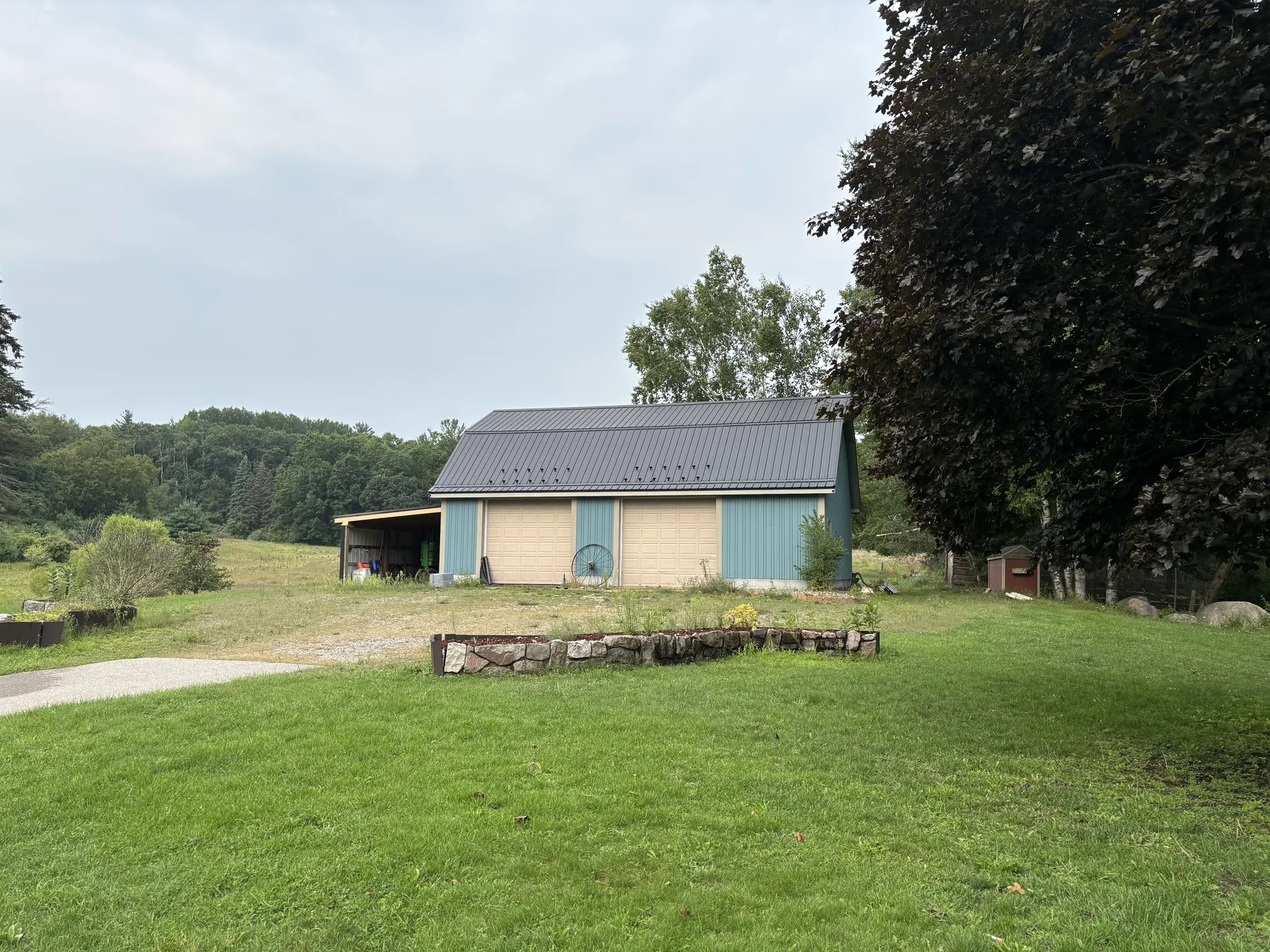 Pole barn and workshop across the lawn